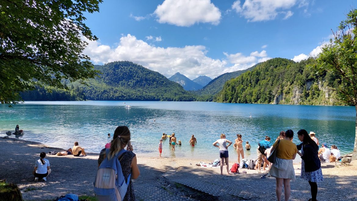 alpsee-hohenschwangau-swimming-bavaria-germany people swimming in alpsee lake in summer hohenschwangau near neuschwanstein castle, bavaria-germany