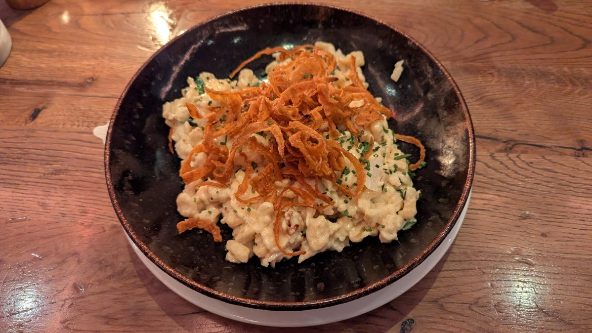 kaesespaetzle-rosted-onions-munich-bavaria-germany kaesespaetzle roasted onions munich bavaria germany bavarian comfort food close-up