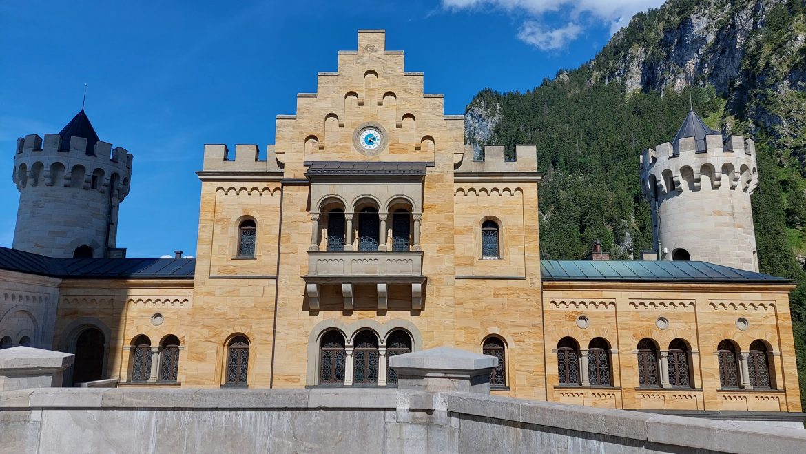 neuschwanstein-castle-inside-castle-summer-bavaria-germany summer courtyard perspective of neuschwanstein castle, bavaria-germany