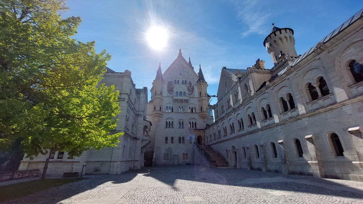 neuschwanstein-castle-inside-summer-bavaria-germany summer view inside the courtyard of neuschwanstein castle, bavaria-germany