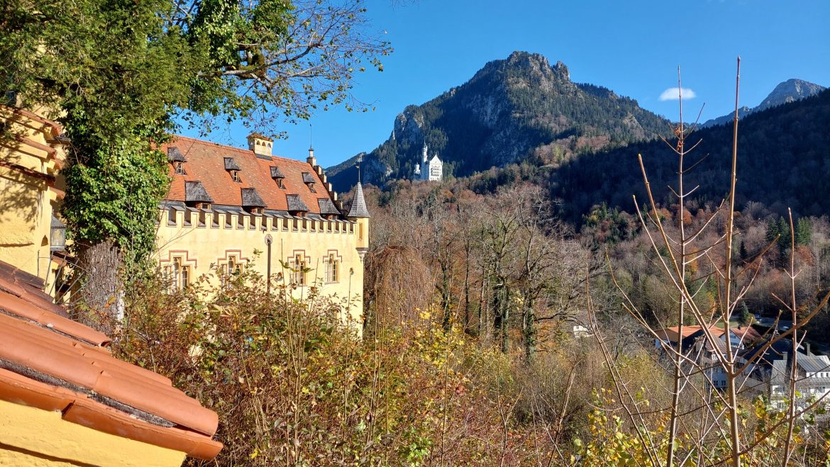 neuschwanstein-castle-view-from-hohenschwangau-castle-bavaria-germany autumn view of neuschwanstein castle from hohenschwangau castle, bavaria-germany