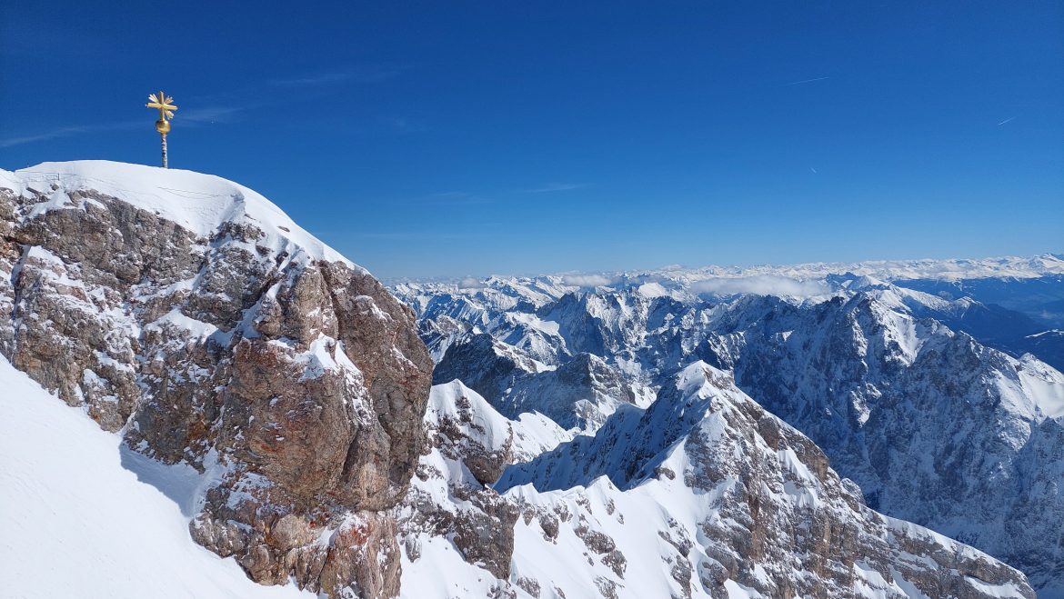 zugspitze-golden-cross-bavarian-alps-bavaria-germany Golden cross on Zugspitze with snowy Bavarian Alps and blue sky, Bavaria, Germany